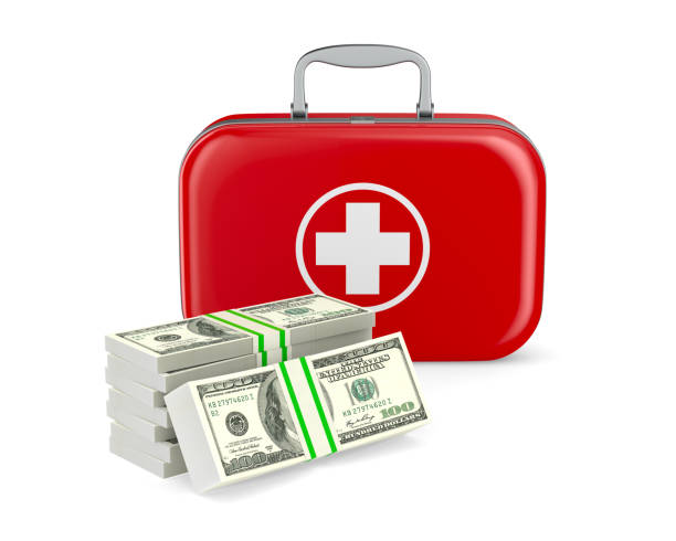 istock first aid kit and money on white background. Isolated 3d illustration 1329885295