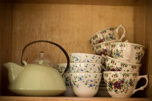istock Ceramic crockery and bowls arranged in a cabinet for home decoration. 1329889987