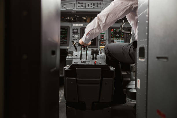 istock Pilot use steering to fly on passenger airplane 1329895348