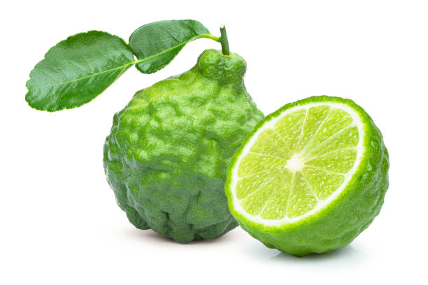istock Bergamot or kaffir lime fruit with green leaf 1329895871
