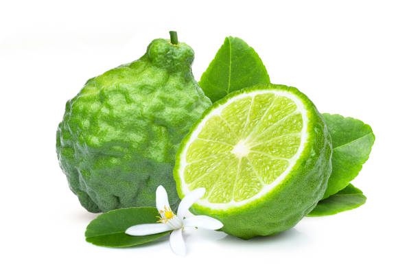 istock Fresh bergamot or kaffir lime fruit with flower 1329895969