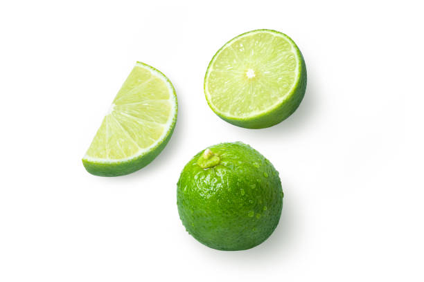 istock Lime fruits and cut in half slice isolated on white 1329896557