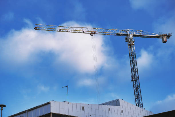 istock Clear sky and industrial crane 1329898622