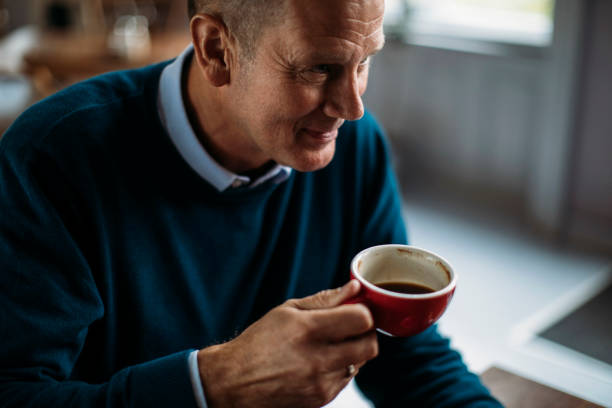 istock Knocking back the coffee to beat the clock 1329901342