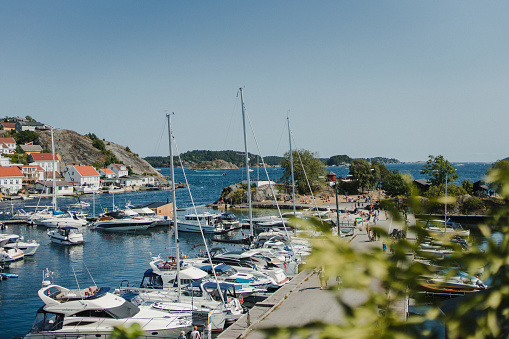 Coast village at the Swedish coastline with boats on the sea