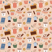 istock Seamless pattern of coffee, geyser coffee maker, sweeties, candles and plants on biege background. fall design of wrapping paper, wallpaper, textile design. Flat hand drawn repeating illustration. 1329903844