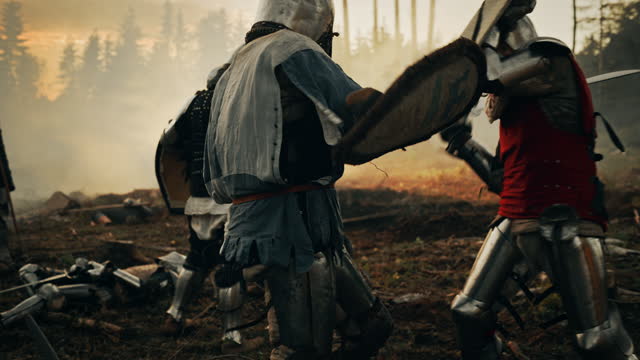 Epic Battlefield: Armies of Medieval Knights Fighting with Swords. Dark Age War, Crusade, Conquest. Action Battle of Armored Warrior Soldiers, Brutal Enemy Killing. Cinematic Historical Reenactment