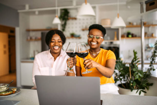 istock Celebrating with friends on a video call 1329911555