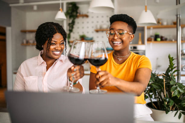 istock Celebrating with friends on a video call 1329912094