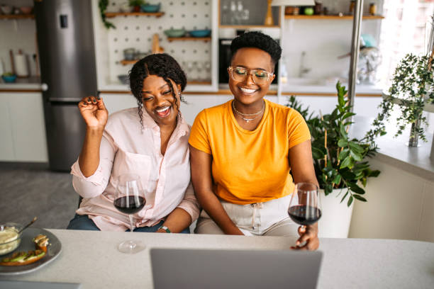istock Celebrating with friends on a video call 1329912130