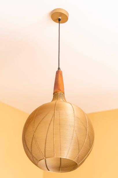 istock modern metal wire lamp hanging ceiling, home decor, vintage bulb light low angle view 1329914684