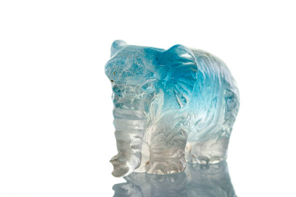 istock beautiful statuette elephant from the mineral topaz on a white background 1329916473
