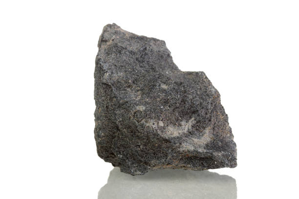 istock macro mineral stone Serpentine on a white background 1329917147