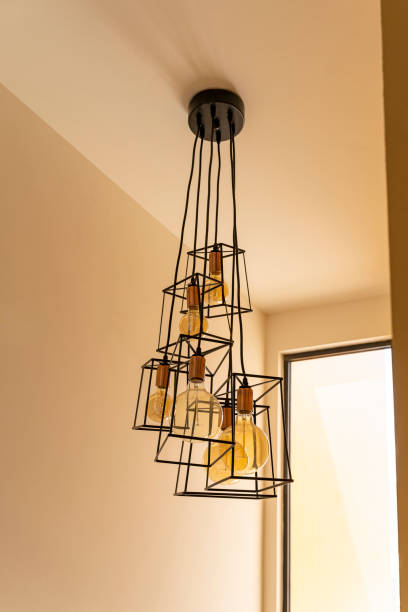 istock modern iron lamp hanging ceiling, home decor, bulb light low angle view 1329917227