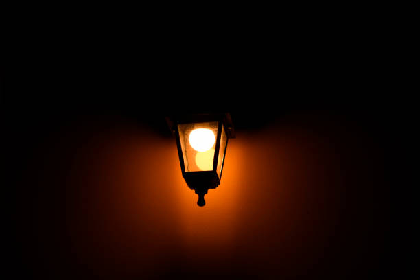 istock A forged lantern that shines dimly in the dark. 1329918358