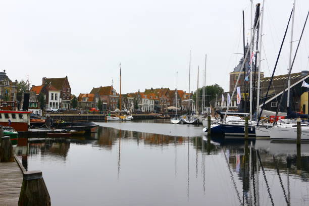 istock Cloudy autumn day in Enkhuizen in the Netherlands 1329921676