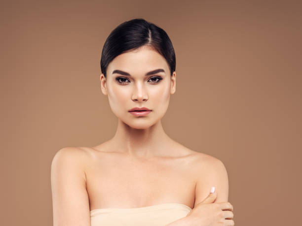 istock Young woman with clean and fresh skin 1329922019