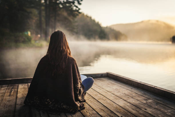 istock Woman relaxing in the nature 1329923039
