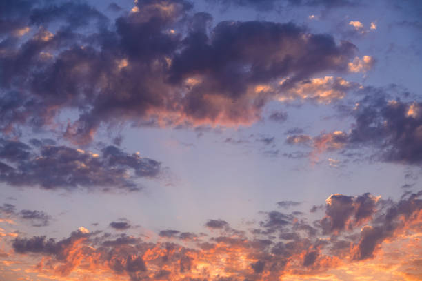 istock Beautiful sky with colorful bright clouds after sunset. Sky nature background. 1329924140