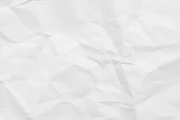 Photo of White crumpled paper texture background.