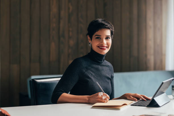 istock Portrait of a Beautiful Successful Architect in her Office 1329929688
