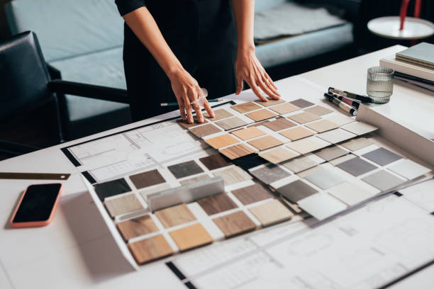 istock Anonymous Female Architect Choosing the Right Color Palette for her Project 1329929725