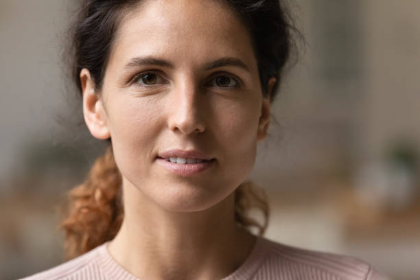 istock Happy attractive young 30s authentic woman looking at camera. 1329931136
