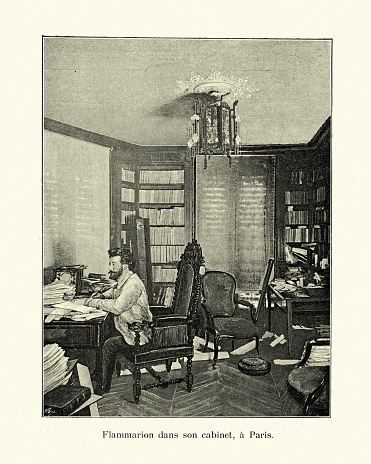 Vintage photograph of Camille Flammarion, French astronomer, in his study in Paris, 1890s. Nicolas Camille Flammarion FRAS was a French astronomer and author. He was a prolific author of more than fifty titles, including popular science works about astronomy, several notable early science fiction novels