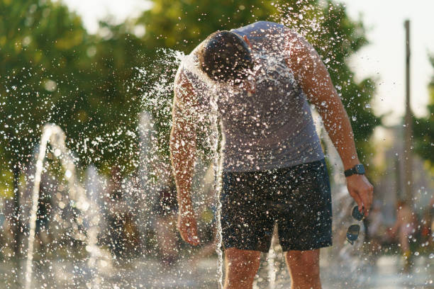 istock Washing with fountain water 1329936109