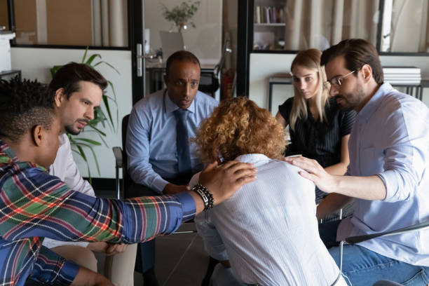 istock Rear view frustrated depressed woman feeling unhappy during group session 1329936167