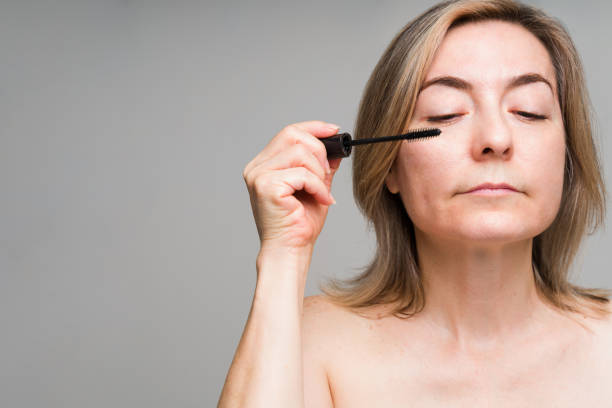 istock Caucasian elderly woman getting ready to go out 1329939336