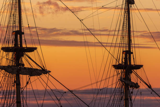 istock ship's mast at sunset pink orange navigation 1329941974
