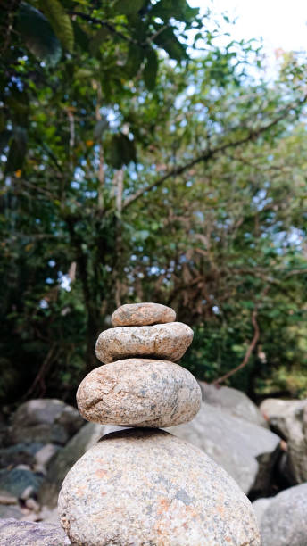 istock Tower Stone and Pebbles beside the river 1329942846