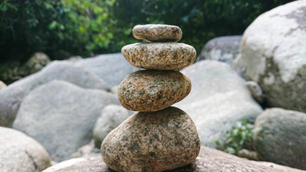 istock Tower Stone and Pebbles beside the river 1329942847