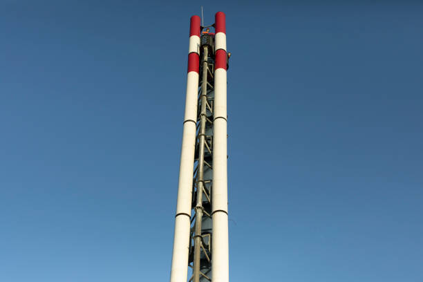 istock Boiler station pipe. Red-white pipe for removing hot steam. 1329943770