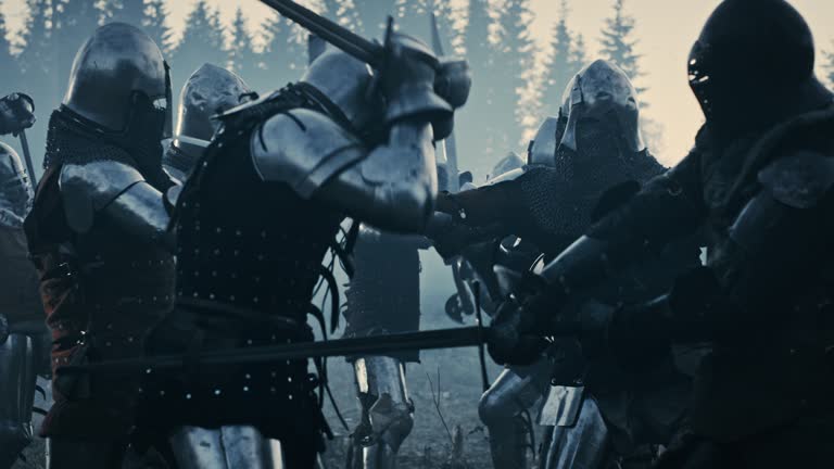 Epic Armies of Medieval Knights on Battlefield Clash, Armored Warriors Fighting Swords. Bloody War, Battle, Invasion. Dramatic Historical Reenactment. Cinematic Blue Light, Slow Motion, Medium