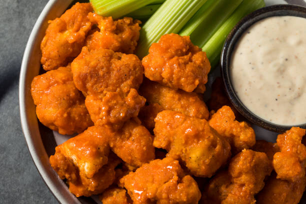 Homemade Fried Boneless Buffalo Chicken Wings Homemade Fried Boneless Buffalo Chicken Wings with Ranch Dressing ranch dressing stock pictures, royalty-free photos & images