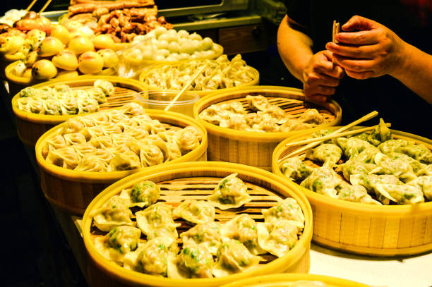 Chinese steamed dumplings from local food market stock photo