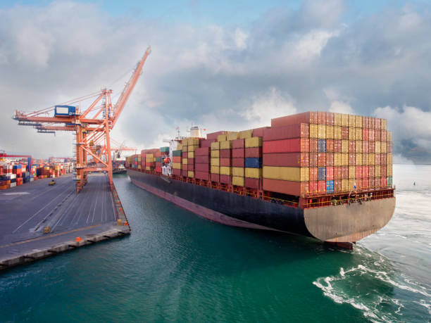 istock Aerial view of cargo ship in transit. 1329949340