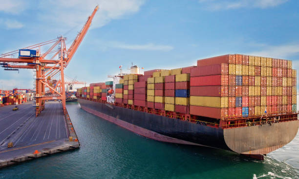 istock Aerial view of cargo ship in transit. 1329950031