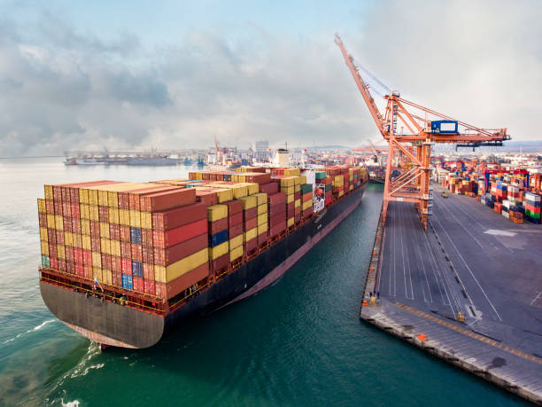 istock Aerial view of cargo ship in transit. 1329950196
