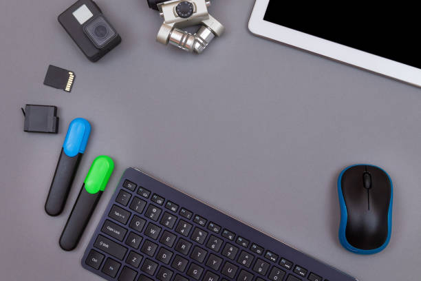istock Digital Gadgets on Grey Table - Video Blogger's Workplace 1329953282