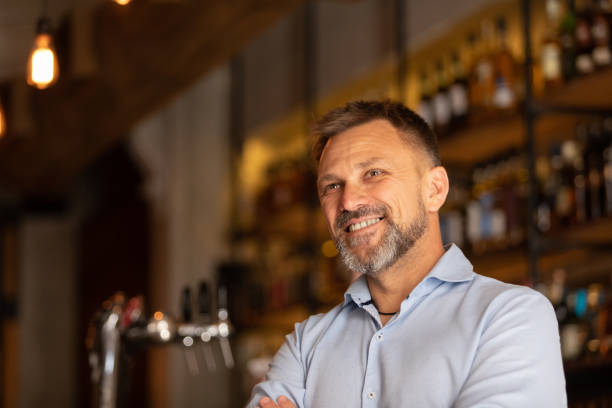 Adult man owner of a bar stock photo