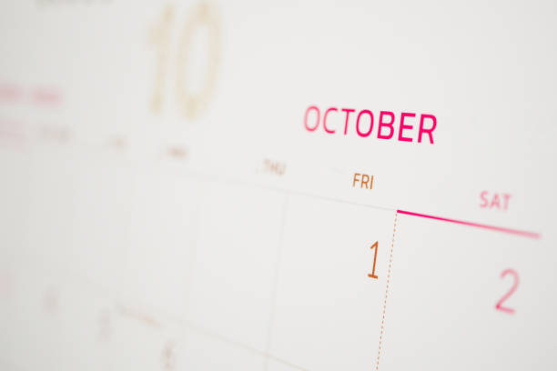 October calendar page with months and dates business planning appointment meeting concept