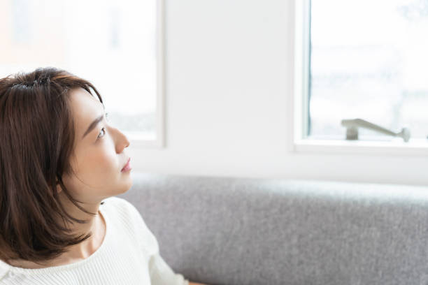 istock attractive asian woman who thinks 1329960337