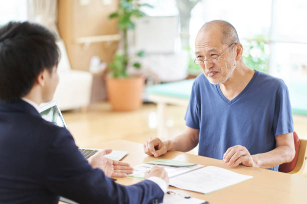 istock Elderly people receive explanations about long-term care facilities 1329970070