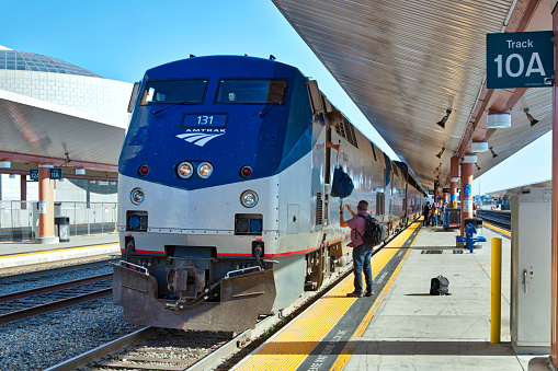 Los Angeles, California, USA - July 18, 2021: Amtrak train at Los Angeles Union Station.\n\nStaff members are preparing for the journey to Chicago