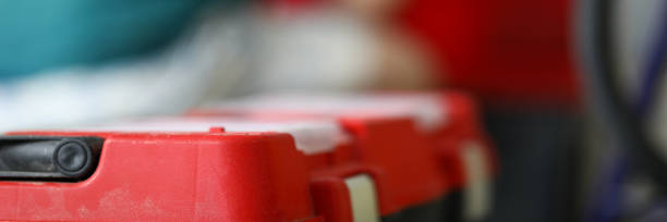 istock A male joiner sits next to a red toolbox 1329983503