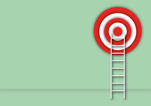istock Ladder to the red target as metaphor for business or success concept. 1329984510