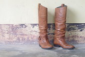 cowboy,cowgirl,leather shoe,brown boots,knee-high boots